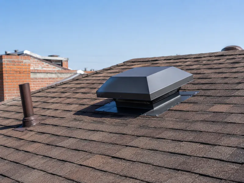 Roof-mounted attic fan