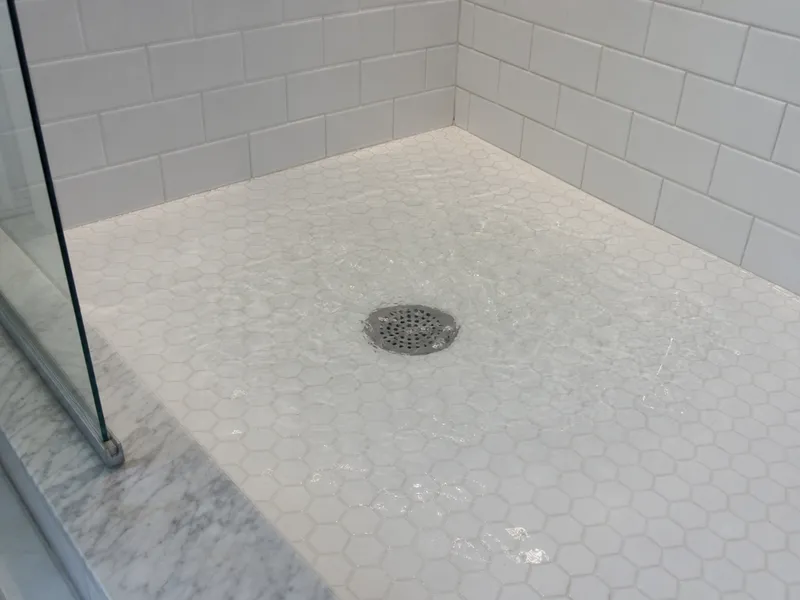 Water backing up into shower
