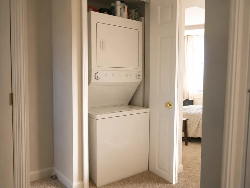 Stackable washer dryer in Bronx apartment closet