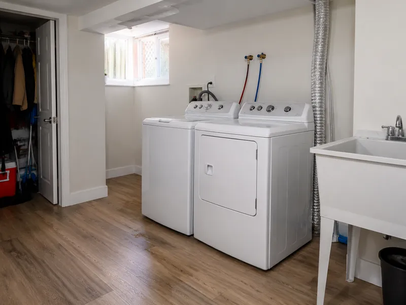 Full hookup for new washer dryer in Staten Island basement
