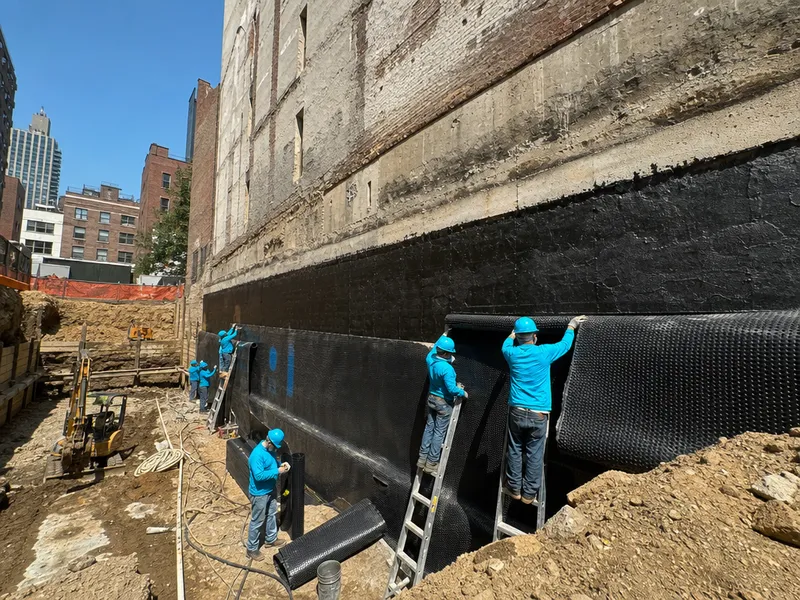 Foundation excavation and waterproofing